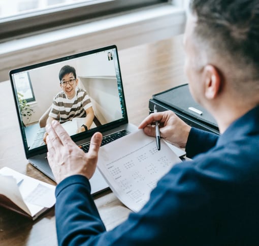 Men having a meeting through video call