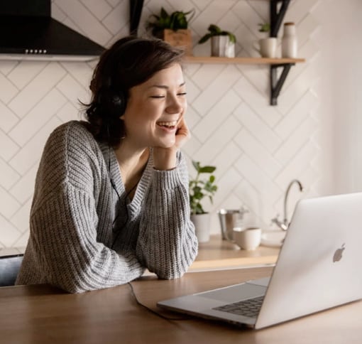 Woman laughing on a video call